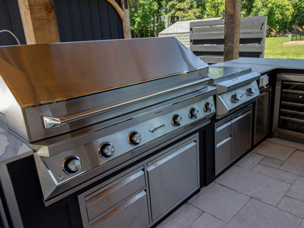 Elegant outdoor kitchen with large, functional grill!