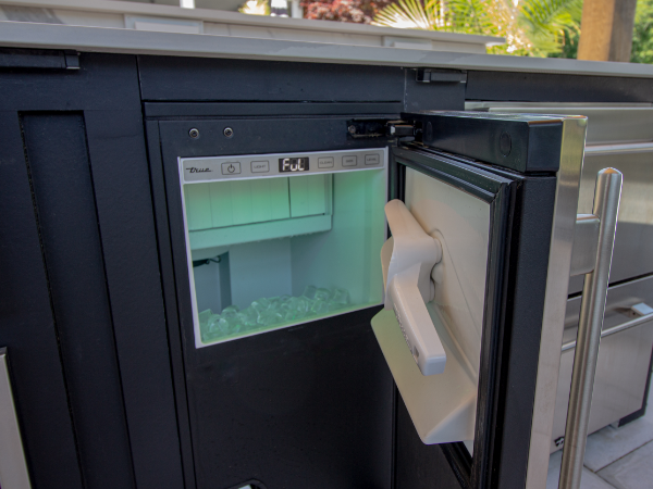 Outdoor kitchen with built in ice machine!